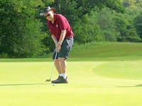 Local school tennis coach completes golf marathon
