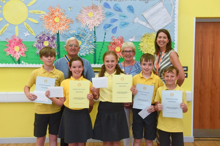Winners and runners-up, together with Rotary President, David Forbes, and Rotarian Olwen Davis and headteacher Sue Marles
