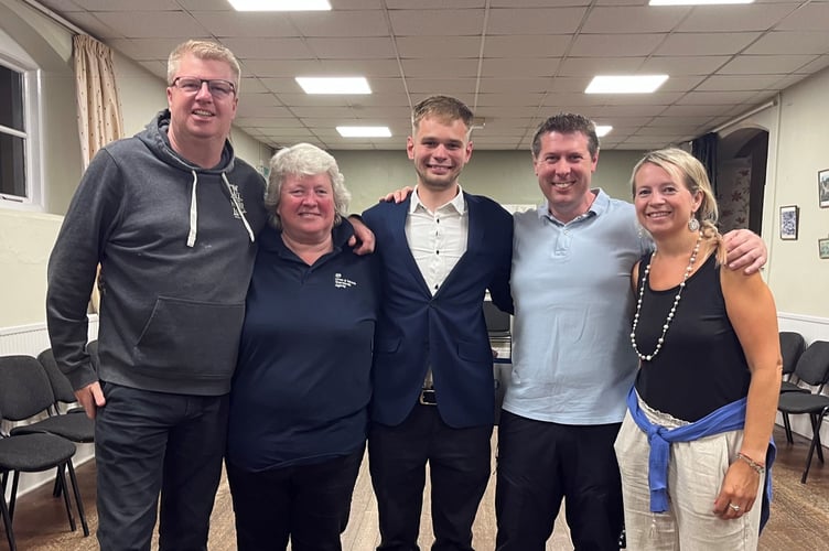 Winning candidate Xavier Turner (centre) with his supporters