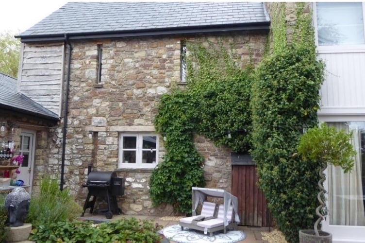 This photograph shows where it was proposed to build the lean-to extension and the arrow slit vents, and window, that would have been lost. Picture: Monmouthshire