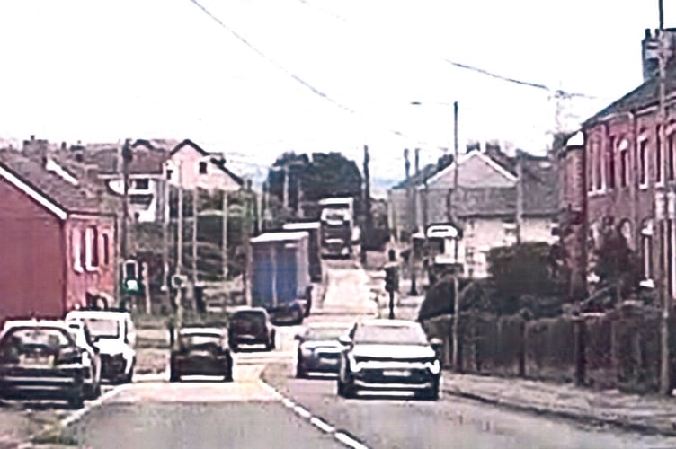 A screenshot of a dash cam of lorries in Caldicot
