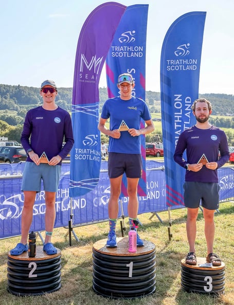 Jak Smith, centre, triumphed in the Aberfeldy Mid-Distance Triathlon