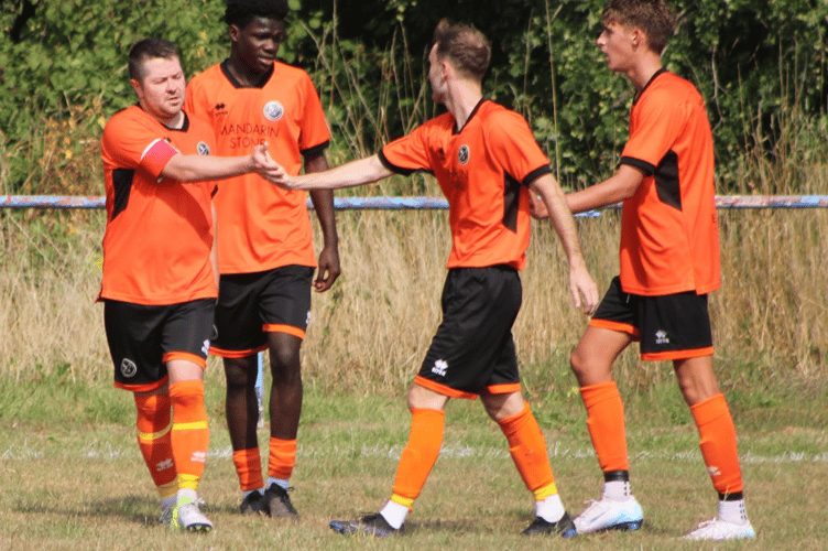  Dan MacDonald, left, was on the scoresheet again for Monmouth Town 