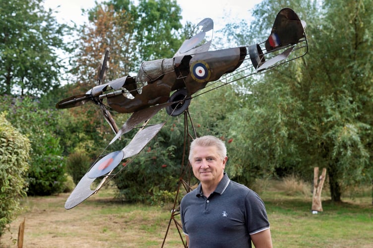 Tim Webb with his Spitfire made out of reclaimed material