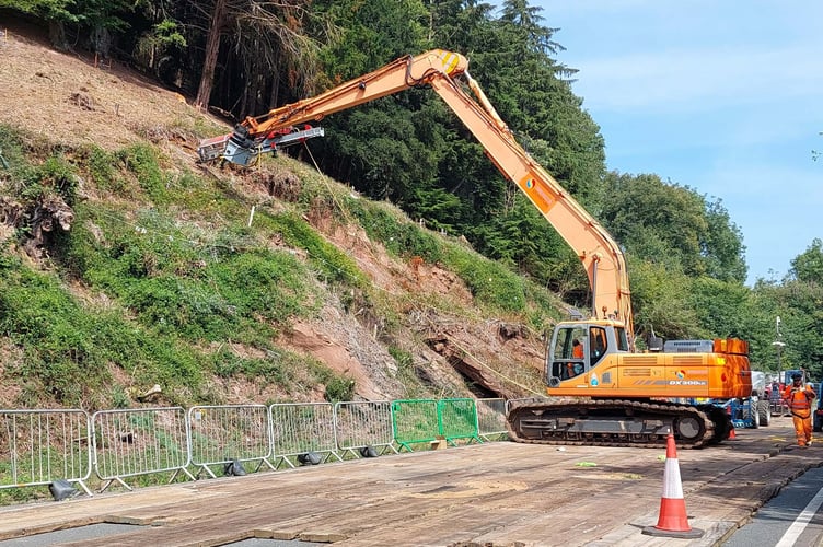 Debris has been removed from the road and work is taking place on the hillside