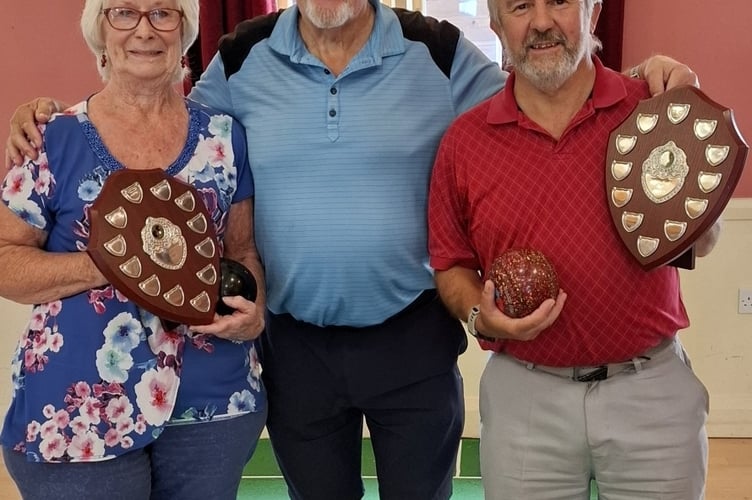 Photo: L-R:- Ladies Champion, Margaret Pidoux; Club Chairman, Graham Holder; Gents Champion, Haydn Holder.  
