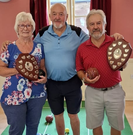 Photo: L-R:- Ladies Champion, Margaret Pidoux; Club Chairman, Graham Holder; Gents Champion, Haydn Holder.  
