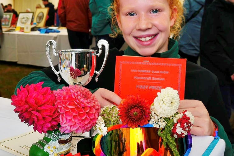 Elin Rees-Williams from the Hendre wins with her Most Unusual Flower Display entry
