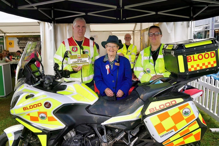 President Miss Sarah Byford MBE presents the winner of Best non-agricultural stand to Blood Bikes