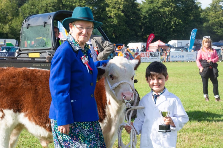 Oscar Coates presented cup for U10 Champion Young Handler (cattle) from Usk Show President Miss Sarah Byford MBE