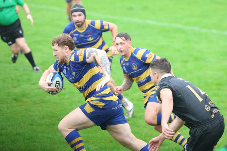 Vice Captain Harry Whelan breaks for Monmouth