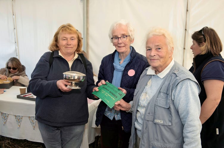 Joint winners for the Sheelagh Wyke Perpetual Rose Bowl given by Louise Williams (centre) for flower was Margaret Sammans and (right) Rose Tedstone