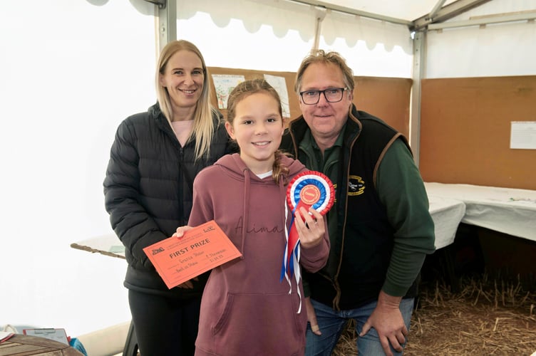 Gracie Shaw won Best in Show (Children's) with Chairman Steve Hole