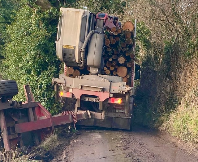 Repair work closes road damaged by shed timber load