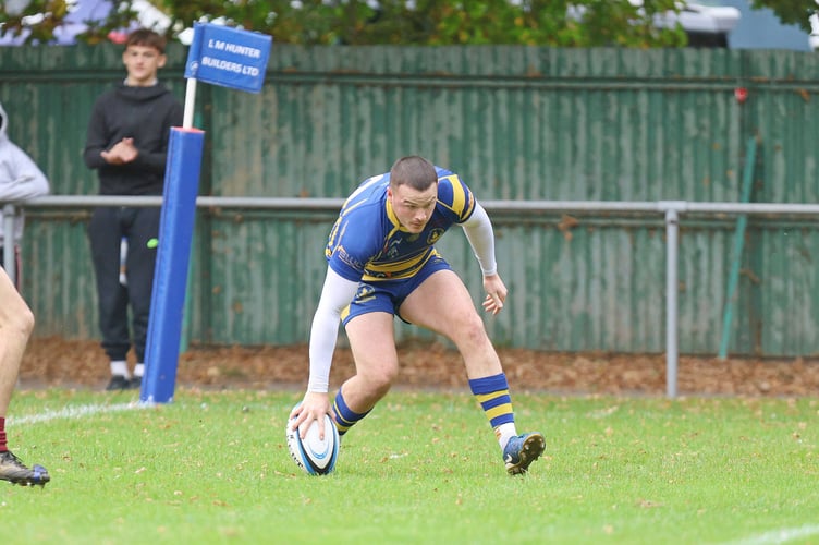 Lewis Bates scores his first try for Monmouth