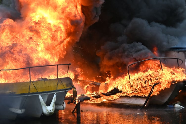 Boats on fire at Goytre Wharf