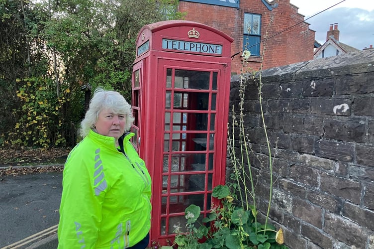 Cllr Lucas with the classic K6 telephone box