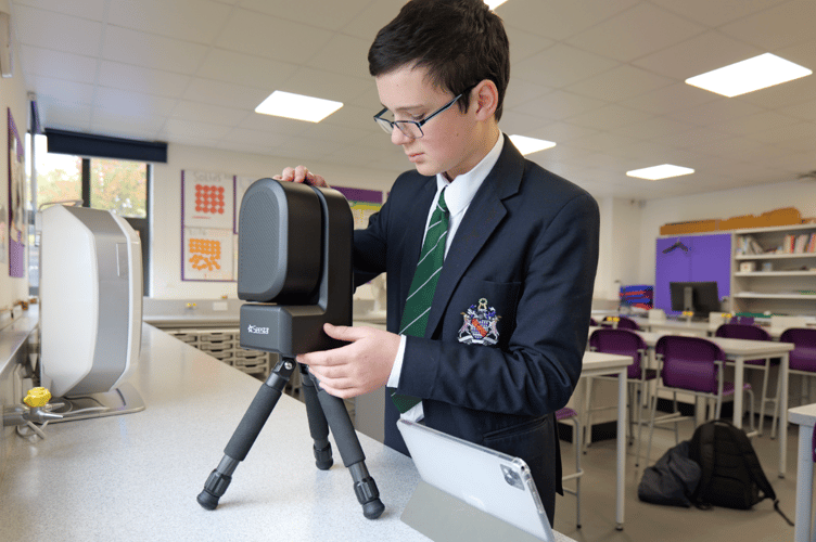 Haberdashers' Monmouth School Astronomy student Sam Johnson setting up the Seestar S50 in the Physics lab. 