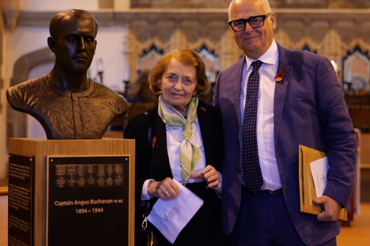 Mrs Aldyth Davies with nephew Martyn Poynor standing next to bronze bust of Angus Buchanan - kindly gifted by Chris Richey.