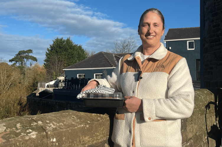 Kate Launder owner of Malthouse Cafe made flapjacks for residents who have been working to recover their shops after the storm.