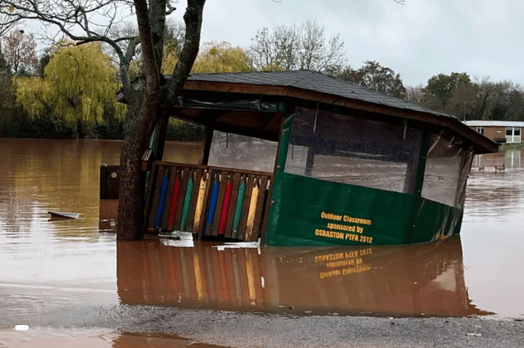 Floodwater has wrecked garden furniture as well as damaging classrooms