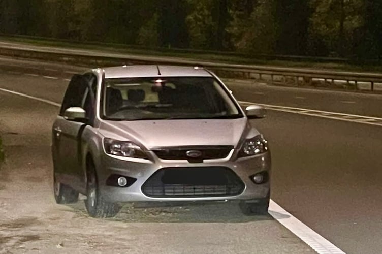 The Ford Focus after executing a U-turn on the M4