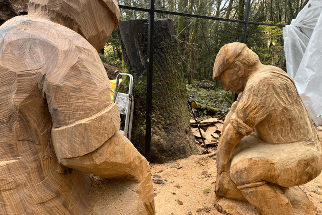 Wood carver creates life-size stone mason sculptures from felled oak 