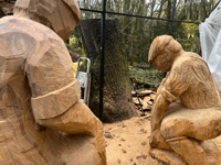 Wood carver creates life-size stone mason sculptures from felled oak 