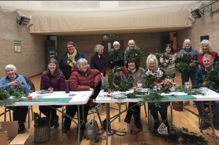 U3A group making Christmas wreaths 
