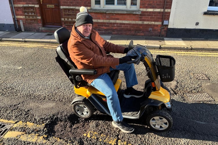 The pothole that threw Mr Dikelis from his scooter