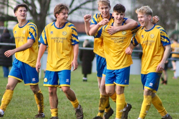 Finley Cummins celebrates a goal on debut for Monmouth Town in their final game of 2025
