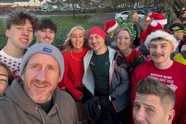 Emma Davies, centre, celebrated running her 200th parkrun over the festive period