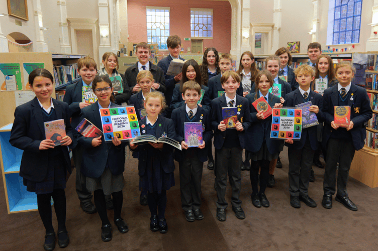 Monmouth Schools coming together to celebrate the launch of Go All in at their community library.