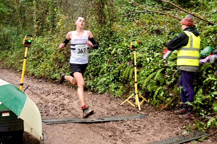 Monmouth Comprehensive student Will Chalk races through the line to take second in the Kymin Winter Hill fell race