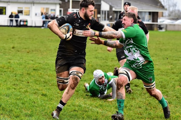 A Chepstow player drives for the line