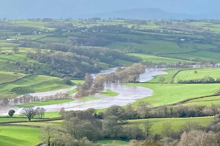 A view of the Monnow flooding fields north of Monmouth near Tregate Bridge, with the Skirrid in the distance