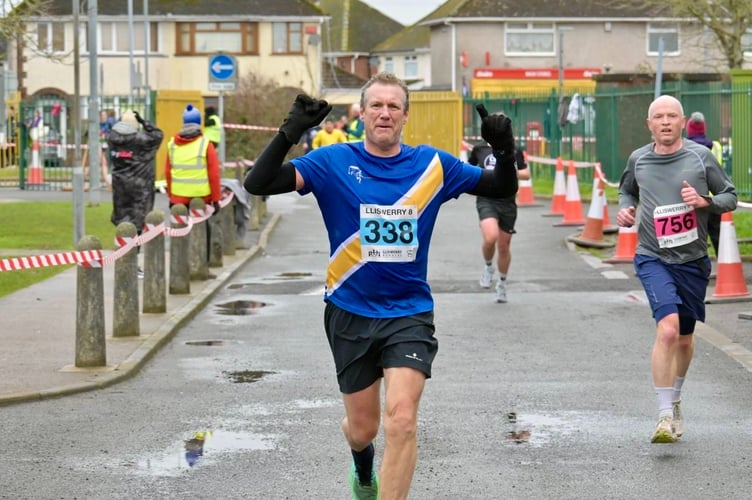 Nick Sloper salutes the finish line