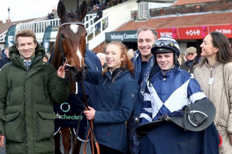 Sam Thomas, left, celebrates with Steel Ally and the team