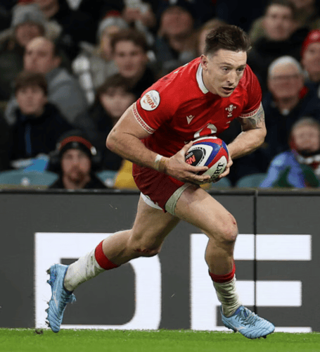 Josh Adams goes over for Wales' try