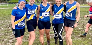 Spirit runners are mud for it as rain pours 