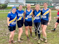 Spirit runners are mud for it as rain pours 
