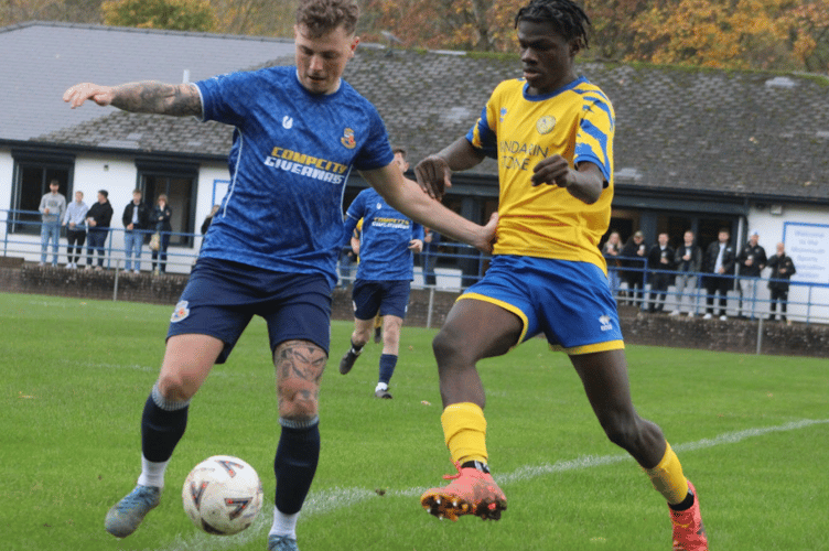 A Corries defender just beat Lamin Ndure to a dangerous ball into the box. File photo: James Townley