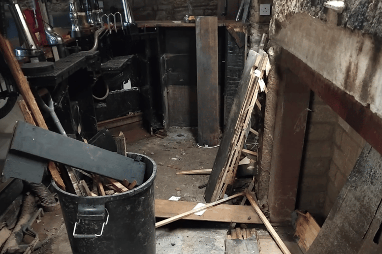 Inside the Robin Hood pub in Monmouth after the November flooding.