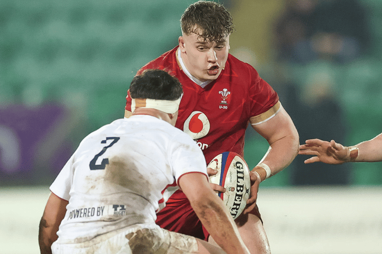 George Tuckley on the charge for Wales U20s against England