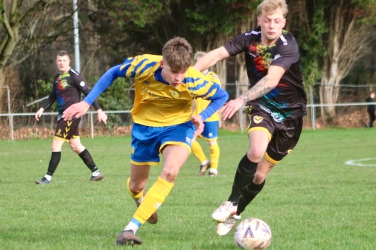 A Kingfishers player is first to the ball to launch another attack