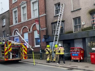 Fire service removes dangerous glass pane from Monmouth high street