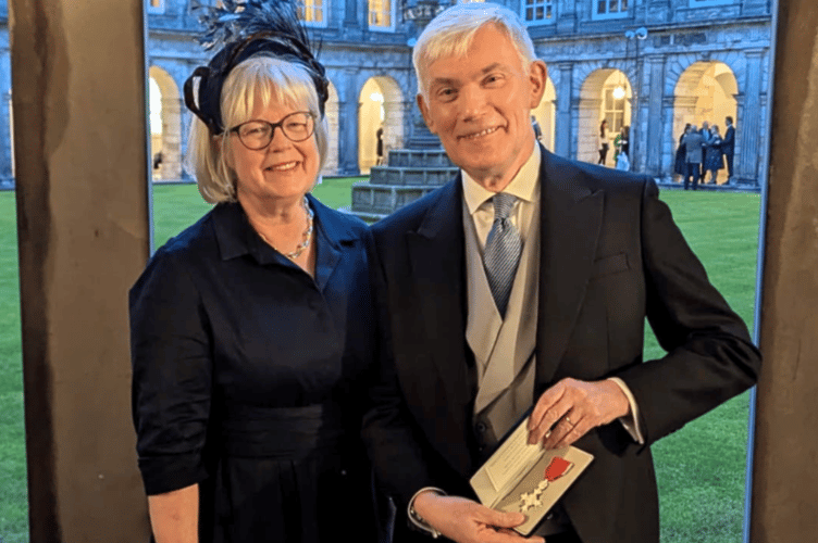 Melvyn Roffe MBE with his wife Catherine Stratford after he was awarded an MBE at the Palace of Holyroodhouse in Edinburgh.