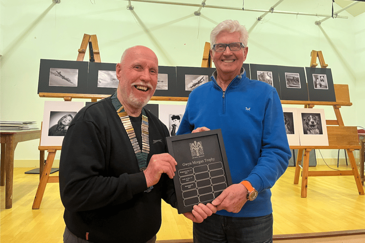 Ron Lines the president of the Welsh Photographic Federation presenting the Glyn Morgan Trophy to Ken Needs the Chairman of the Pyle and Porthcawl Photographic Society. (left to right)