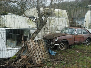 Council considers next move over 'blot on landscape' car collection