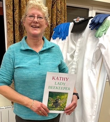 Kathy creating a buzz at their February meeting